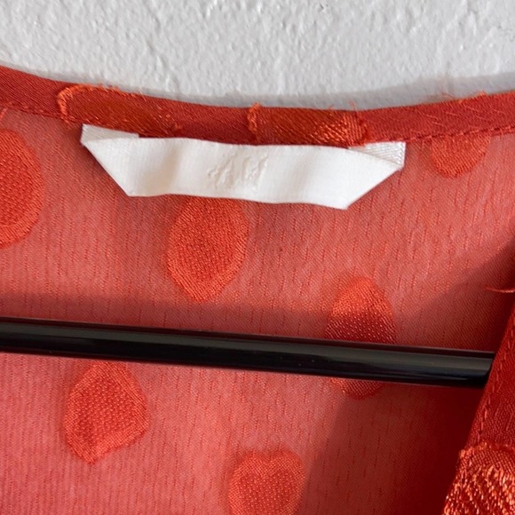 H&M woman’s medium red long sleeve blouse with tie cinched waist & polka dots - Picture 4 of 8